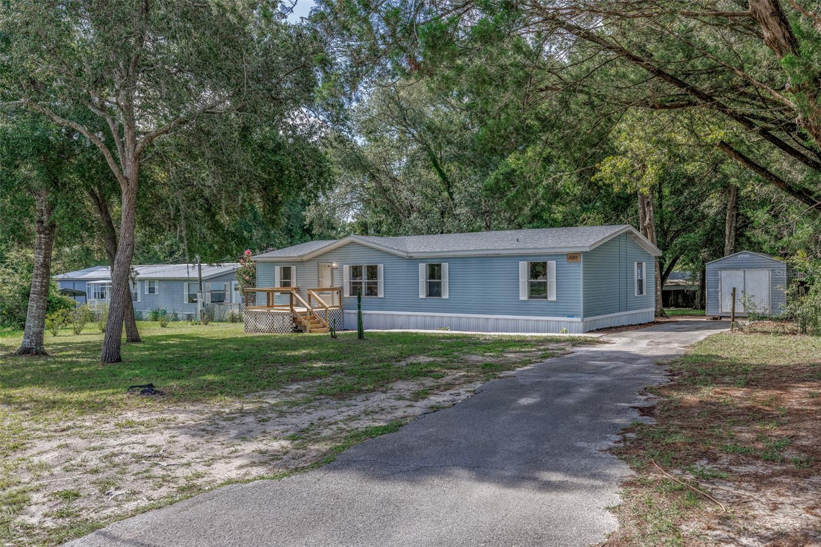 Beautifully Renovated & Move-In Ready! This charming, updated 3-bedroom, 2-bath home in the Hiltop subdivision sits on nearly half an acre and offers 1,560 sq ft of modern, stylish living space. NEW ROOF NEW HVAC(2023) NEW LUXURY VINYL FLOORING NEW 40 GALLONS ELECTRIC WATER HEATER.Step inside to discover sleek quartz countertops, fresh cabinetry and vanities, and a stunning new walk-in shower. The kitchen features newer stainless steel appliances, complemented by updated LED lighting and ceiling fans throughout. Additional upgrades include new baseboards and new decking with steps at all entries. With no HOA and plenty of room to add a pool and a nice-sized shed. Perfectly located with convenient access to Liberty Park and the scenic Withlacoochee State Trail, you’ll have endless options for outdoor recreation—whether it’s biking, hiking, or simply soaking in nature. Spend weekends exploring local favorites like Whispering Pines Park, Cooter Pond Park, or Fort Cooper State Park, ideal for birdwatching and serene nature walks. Just a short drive brings you to historic downtown Inverness, where you can enjoy the charm of the 1912 courthouse, boutique shopping, and dining hotspots. About half an hour to the FLORIDA'S TURNPIKE going to ORLANDO.Don’t miss this beautifully updated home in a location that offers both comfort and adventure!