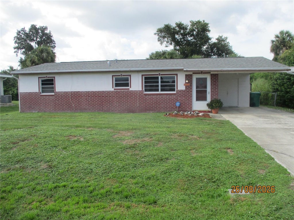 Photo of 22544 Blanchard Avenue, Port Charlotte, FL 33952 (MLS # C7529992)