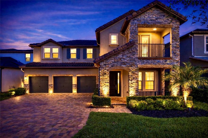 One or more photo(s) has been virtually staged. Seller is offering up to $10,000 in concessions, creating an exceptional opportunity for today’s buyer.
Where natural light, space, and lifestyle align. Presenting a rare opportunity to own a beautifully designed, move-in ready luxury residence that seamlessly blends elegance, functionality, and the life you desire.
From the moment you arrive, the home’s tile roof, balcony, and charming front porch set the tone for a refined yet inviting experience. Situated on one of the community's few homesites offering a balcony, conservation views, no rear neighbors, this home stands apart in both design and presence.
Step inside to an extended foyer with 10-foot ceilings, creating a grand and welcoming entrance. Thoughtfully designed with both entertaining and everyday living in mind, this home features a formal living room, along with a formal dining space that carries the same elevated feel. A conveniently placed powder bath, and an under-stair closet, add to the home’s functionality.
As you move into the main living area, you’re greeted by a stunning two-story family room filled with abundant natural light. The open-concept layout flows seamlessly into a chef-inspired kitchen featuring ceiling-height cabinetry, quartz countertops, stainless steel appliances, wine fridge, and a butler’s pantry alongside a spacious walk-in pantry. A dedicated café area overlooks a serene conservation backdrop, offering uninterrupted sunrise views and a peaceful setting that truly captures the beauty of Florida living.
The first-floor primary suite is privately positioned and thoughtfully designed, featuring tray ceilings, and tranquil backyard views. The spa-like primary bath includes a soaking tub, walk-in shower, dual vanities, private water closet, and a spacious custom walk-in closet with built-in shelving and drawers. For added convenience, the closet connects directly to the laundry room, pre-plumbed for a sink.
Additional features on the main level include a drop zone, three-car garage access, and ceiling speakers.
Upstairs, engineered hardwood flooring leads you to an expansive loft that opens to the private balcony, creating a seamless indoor-outdoor retreat. The second level also features a large game room, a dedicated media room pre-wired for a projector and sconces, and three additional bedrooms, all with walk-in closets. Two bedrooms share a Jack-and-Jill bath, while an additional en-suite and half bath provide comfort and flexibility for family and guests.
Throughout the home, you’ll find elevated upgrades including 8-foot interior doors, extended sliding glass doors, and a motorized screened-in lanai, plus a backyard ready to be customized to your vision. 
Located in a highly desirable community with A-rated schools, residents enjoy access to a community pool, playgrounds, and scenic walking trails. The home is ideally positioned just minutes from everyday conveniences: shopping, dining, fitness, and entertainment options.
Enjoy quick access to Florida’s Turnpike, connecting you to all Orlando offers, major sporting and entertainment venues, and Orlando International Airport within apprx. 30 minutes. Disney World is just 25 minutes away, while Hamlin, and Historic Downtown Winter Garden's charming farmers markets, local events, and vibrant community atmosphere are just minutes from your doorstep.
Tucked away for privacy, yet close to everything that matters, this home delivers the perfect balance of peace, convenience, and lifestyle.