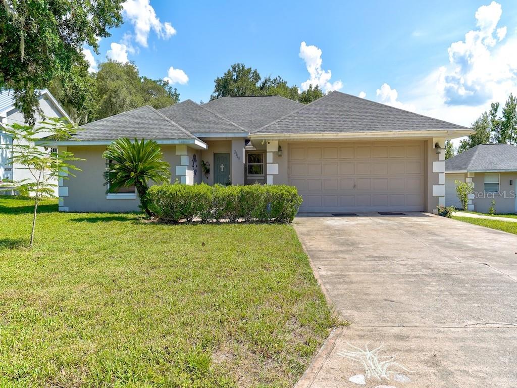 THIS BEAUTIFUL 3 BEDROOM 2 BATH HOME WITH A DETACHED WORKSHOP/ GARAGE IS IN A WELL ESTABLISHED NEIGHBORHOOD . THIS PROPERTY ALSO HAS A 2 CAR GARAGE THAT IS ATTCHED TO THE HOME . AS YOU ENTER THE LARGE SPACIOUS LIVING ROOM YOU WILL SEE THIS HOME HAS AN OPEN FLOOR PLAN . THE KITCHEN IS VERY SPACIOUS WITH LOTS OF CABINETS OVERLOOKING THE DINING ROOM .THE MASTER BEDROOM OFFERS A WALKIN SHOWER , LARGE WALKIN CLOSET . IF YOU ARE LOOKING FOR SPACE THIS HOME SURE HAS IT WITH OVER 2596 TOTAL SQFT UNDER ROOF PLUS THE WORKSHOP THAT SITS ON .29 ACERS OF LAND . THIS PROPERTY IS CLOSE TO HWY 27 AND I-4 . COME SEE THIS HOME TODAY