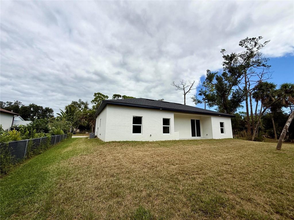 Photo of 17065 Malta Avenue, Port Charlotte, FL 33954 (MLS # O6290978)