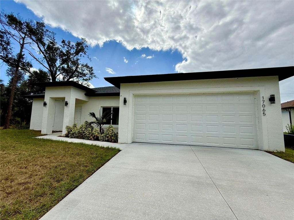 Photo of 17065 Malta Avenue, Port Charlotte, FL 33954 (MLS # O6290978)