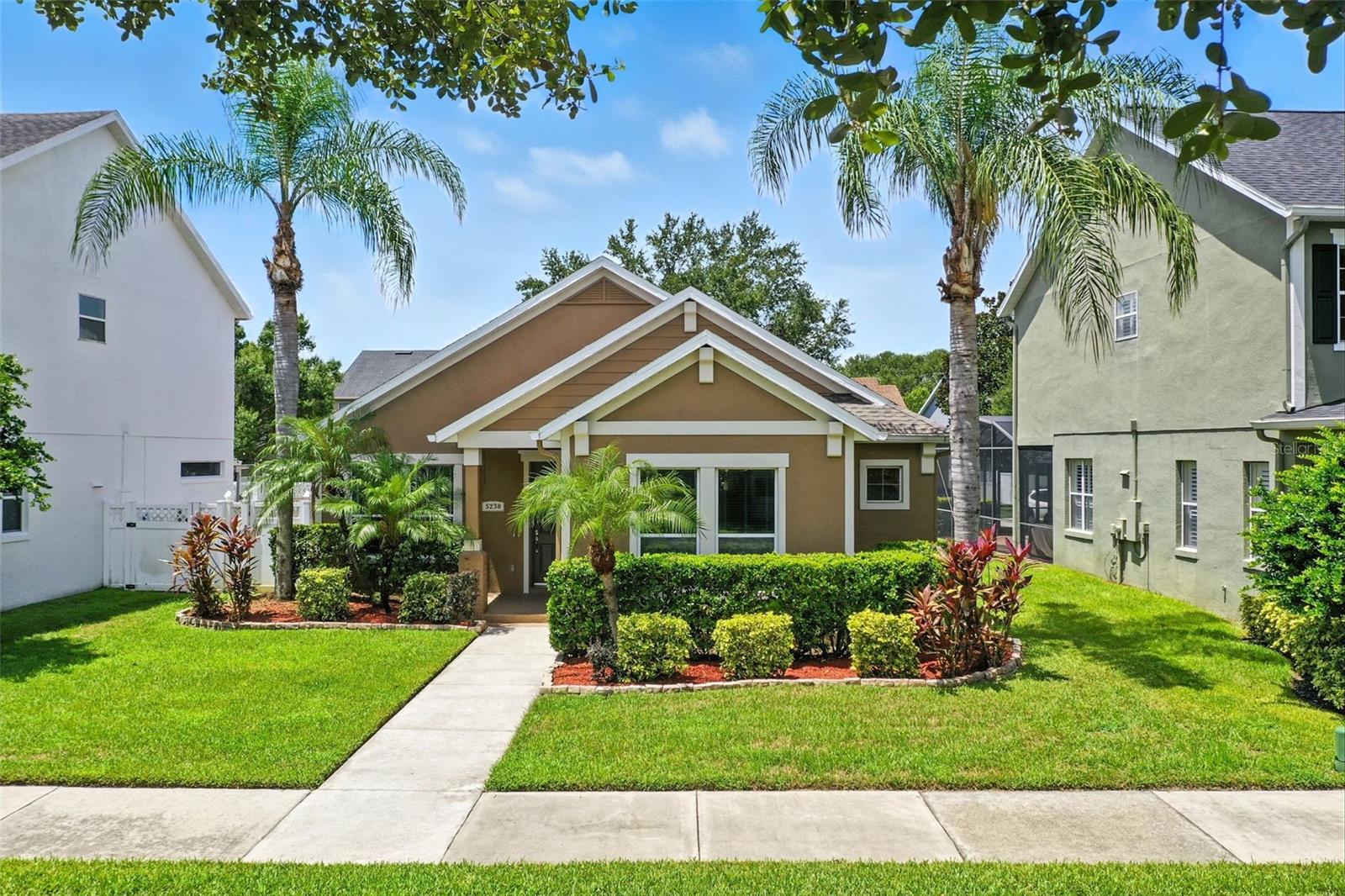 Located in the desirable community of Windermere, this beautifully maintained home offers a blend of comfort, style, and privacy. A new roof installed in 2022 provides peace of mind, while thoughtful updates enhance everyday living. The spacious primary suite features a huge walk-in closet, and an oversized upstairs suite with a full bath offers versatility for guests or a private retreat. The matching countertops throughout the home create a cohesive and elegant feel. Enjoy the newly extended screened-in lanai with an outdoor TV, perfect for relaxing or entertaining, along with a back paver area ideal for grilling or a firepit. This property offers easy access to local shopping, dining, and top-rated schools, making it a wonderful place to call home.