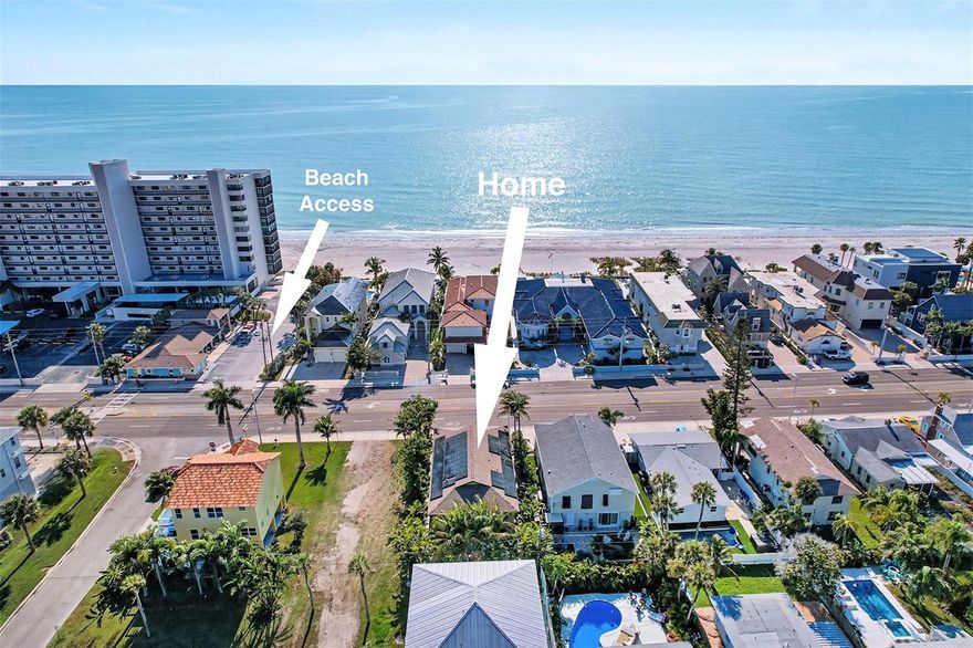 Stunning elevated beach home in sought-after Redington Beach, ideal for entertaining. This three-bedroom, two-bath residence offers 1,969 square feet of bright open interior living with about 4,000 total square feet, including 1,100 square feet of covered outdoor living space, with partial ocean views from the front balcony and easy beach access nearby. Recently renovated with marble-inspired large tile, quartz counters, stainless appliances and an expansive kitchen ideal for gatherings. Both baths feature custom tile, new vanities and glass enclosures, and the primary bath includes a bear claw soaking tub. The main suite spans the entire left side of the home, and bedrooms two and three are spacious with abundant natural light. Interior highlights include an onyx window above the staircase, Hunter Douglas blinds, inside laundry with sink/cabinet/ironing board, and a smart thermostat. Outstanding outdoor and mechanical upgrades include covered downstairs porch with a built in kitchen with natural gas grill/cooktop and sink, tropical landscaping, paver patio, LED landscape lighting, 52 LUNEX solar panels, Tesla Powerwall, Lifesource salt-free water purification, new GAF lifetime architectural roof, Trane XV20i 4-ton air conditioner on aluminum stand, attic dehumidifier with R8 insulation, and Mitsubishi mini split in the garage. Additional features include a four-car air-conditioned garage with four doors/openers and vaulted ceilings, all block construction, hurricane-rated PGT windows and doors, articulating Bahama shutters, sprinkler system on reclaimed water, and generous walk-in closets. Experience elevated Florida beach living, modern, efficient and built to entertain.
