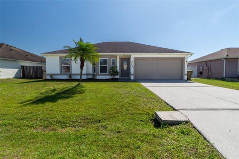 Photo of 719 Versailles Lane, Kissimmee, FL 34759 (MLS # O6345787)