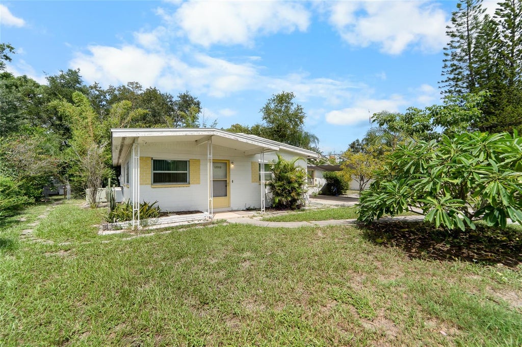 Photo of 12312 N 27th Street, Tampa, FL 33612 (MLS # TB8553143)