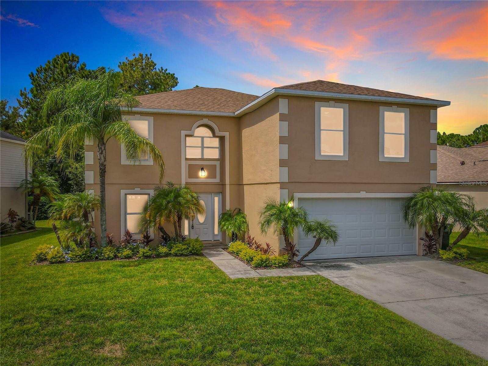Renovated in 2025, this spacious 5-bedroom, 3.5-bath home in Wetherbee Lakes offers over 2,800 sq. ft. of living space with vaulted ceilings and multiple living and dining areas. The updated kitchen features white shaker cabinets, granite countertops, stainless steel appliances, and a large island that opens to the family room. The first floor includes porcelain tile flooring, a guest suite with full bath, and a half bath. Upstairs offers a versatile loft, an oversized primary suite with dual walk-in closets and refreshed bath, plus three additional bedrooms and a full bath. Recent updates include new flooring throughout, fresh interior and exterior paint, updated lighting and fixtures, and a new roof in 2024. Additional features include an indoor laundry room with cabinetry, a two-car garage, and a private backyard with no rear neighbors backing to conservation. Conveniently located near Lake Nona, Orlando International Airport, shopping, dining, and major highways. Move-in ready and available now. Schedule your private showing today.