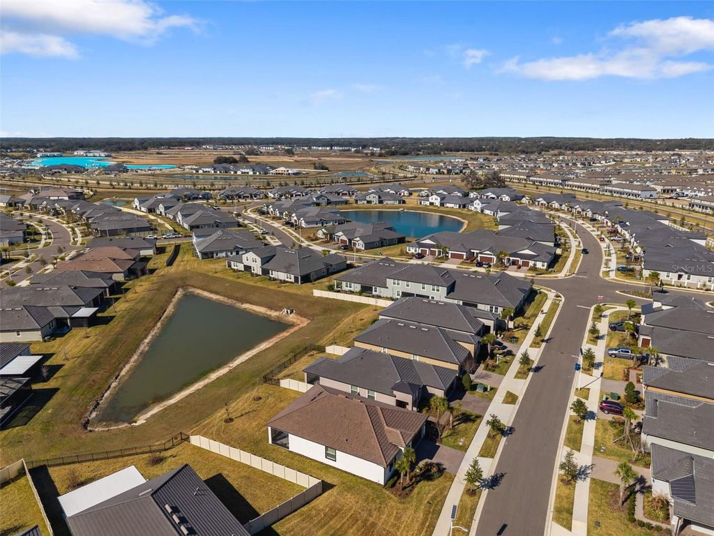 Photo of 10499 Gable Dig Loop, San Antonio, FL 33576 (MLS # TB8478972)