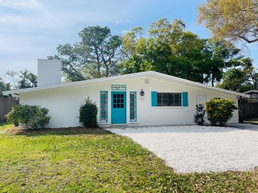 Nestled on a charming "canopy" designated street, centrally located in Sarasota. This home exudes timeless excellence.  The home from the mid century modern era, offers the perfect blend of vintage charm and modern convenience. The home has 3 bedrooms and 2.5 baths, walk-in closets in two of the bedrooms, and has nearly 1500 sqft of living space. The home creats a warm and inviting atmosphere for both daily living and entertaining. The kitchen and bathrooms have granite counters. The entire interior and exterior has been recently painted. Beyond the interior, a spacious backyard awaits, promising endless possibilities for outdoor gatherings. Convenience is key, as the residence is stratigically located near shopping and restaurants, ensuring that every need is within easy reach. Top ranked Siesta Key is a short 15min drive from the home, and the interstate is a short drive. This mid century modern gem offers not just a home but a lifestyle. A timeless retreat in a centurallocation, where the past meets the present semlessly, inviting you to create lasting memories in a place you will be proud to call home.