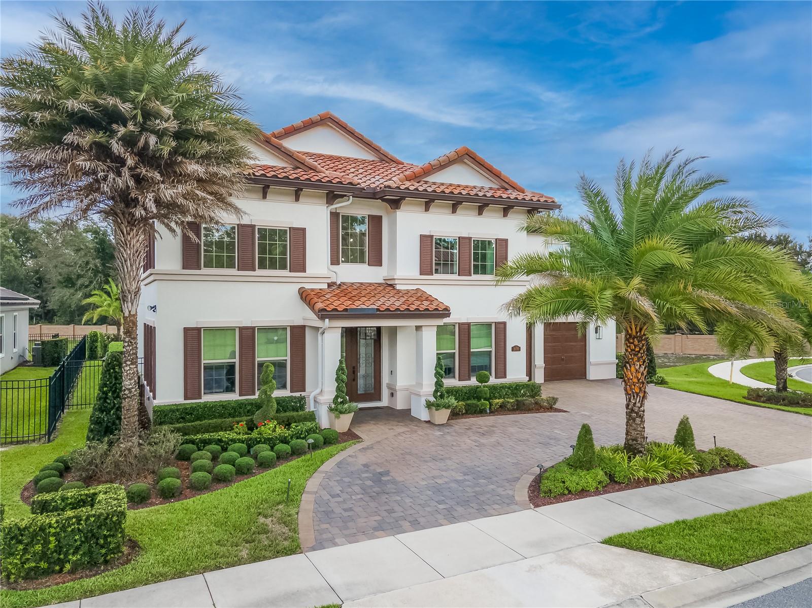 Stunning home in the gated community of Steeple Chase! Beautiful model home quality with a WOW factor in this fabulous home made for entertaining! Meticulously maintained. Built with modern day conveniences, this home features a well thought out floor plan consisting of 5 bedrooms, 6.5 baths, formal living room and dining room, upstairs bonus room/game room opening to a huge balcony, separate media room, 4 way bedroom split upstairs, dedicated office and a SPECTACULAR outdoor space. All of the bedrooms are en-suites. The foyer and living room areas feature 21 foot high ceilings with plentiful natural light through out the home. The light and bright kitchen features Calcatta quartz countertops, solid wood cabinets, Monogram appliances, convenient pot-filler, vented hood, natural gas cooktop and an oversized island. The kitchen opens naturally to the dinette area and the spacious family room. Entertain your guests in the luxurious outdoor area. Plentiful covered lanai space with a well-appointed summer kitchen and a large deck to entertain friends and family with beautiful Silestone pavers. The impressive summer kitchen features porcelain countertops with under lighting, counter height seating, outdoor grill with a vented hood, sink, and beverage drawers. This magnificent home must be seen in person to be truly appreciated! This home is zoned for top-rated schools, convenient to world-class golf & tennis, dining, shopping, hospitals and easy access to I-4, 417 & 429 and private access to the Seminole County Trail. Call for your showing today!