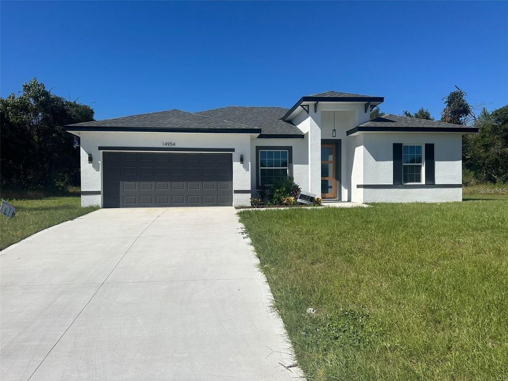 Photo of 14954 SW 38th Circle, Ocala, FL 34473 (MLS # O6359036)