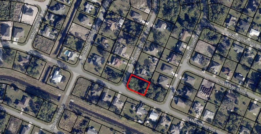 Discover the perfect opportunity to create your Florida dream home on this spacious corner vacant lot in the rapidly growing city of Palm Bay! Located in a peaceful residential neighborhood with paved roads, this lot offers the best of both worlds — a quiet setting with all the conveniences of city living just minutes away.
Whether you’re looking to build, invest, or retire, this property provides endless potential. Palm Bay’s natural beauty, affordable lifestyle, and strong community make it one a much desired area.
