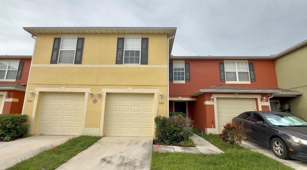 Photo of 609 Cresting Oak Circle #98, Orlando, FL 32824 (MLS # S5153423)