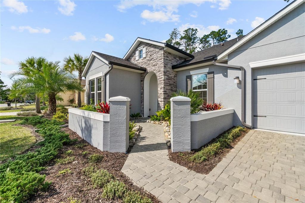 Photo of 358 Stirling Bridge Drive, Ormond Beach, FL 32174 (MLS # FC314616)