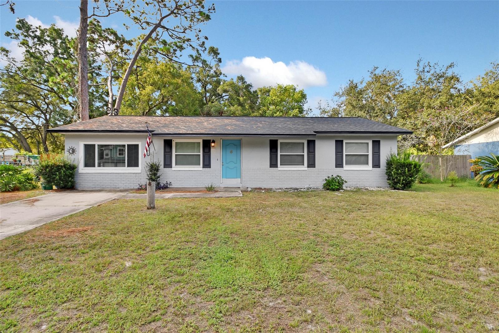 Well Maintained Cute and Cozy 3 Bedroom 1 Bath Home, Move In Ready, New Roof 2024, A/C 3 Years Old, Recently Painted Inside and Out,
New Windows and French Door 2020, Kitchen Has Wood Cabinets and Stainless Steel Appliances, Wood Look Tile Flooring, Remodeled Bathroom with New Vanity, Tub, Tile and Toilet, Privacy Fenced Backyard, Oversized Lot, Great Location Minutes From Schools, Shopping, Restaurants, Hospitals, Several Parks, Bike and Hiking Trail, 30-45 Minutes to Daytona Beach or Orlando. Call today to Preview. All Information Deemed Correct but not Guaranteed. Buyer and Buyer's Agent to Verify. The Home May be Under Video/Audio Surveillance.