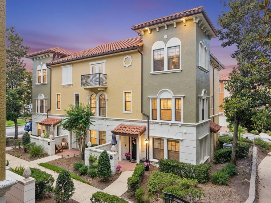 One or more photo(s) has been virtually staged. Discover this move in ready stunning 4-bedroom, 3.5-bathroom end-unit elevator townhome that is located in the highly sought-after Fountain Parke community in Lake Mary. This CORNER/END Unit Home is a standout with unmatched privacy with no neighbors on three sides, creating the feel of a single-family home.  Original owner and meticulously maintained!  The home is bright and inviting with abundant natural sunlight streaming through the windows, the home is bright and inviting throughout. This home was built with solid concrete block construction on all three levels which ensure durability and peace of mind. The Tuscan-Inspired Architecture will have you feeling as though you have been transported to Florence Italy, with vibrant colors, well-manicured grounds and and classic barreled tiled red roof lines. Access to each floor is effortless and convenient with a private elevator. A welcoming porch and charming entry way leads into a spacious and elegant interior, perfect for modern living and entertaining. Elegant hardwood flooring runs throughout the home with no carpet. The First Floor has a large bedroom with wood flooring and an updated private en-suite bathroom. Ideal for in-laws, guests or teenagers needing total privacy.  Located on the first floor is access to a garage that includes overhead storage and a professionally applied beenpolyurea base and polyaspartic topcoat floor covering which offers 4x the strength of traditional epoxy coatings. Additional storage is available under the stairwell. Located on the 2ND Floor is the main hub of the home with an expansive great room, dining room and oversized kitchen with plenty of room to host parties. The gourmet kitchen is designed and was remodeled to impress, featuring custom cabinetry throughout, marble countertops, stainless steel appliances, a stylish backsplash, bright 42-inch cabinetry, custom built-in hutch, custom island with storage, a dry bar, and a built-in bookcase. Upstairs on the 3RD floor, is the primary bedroom, en-suite bathroom with dual vanity and a separate shower along with a soak tub. Two additional bedrooms are located on the upper floor with access to a third full-size bathroom. One bedroom is currently used as an elegant dressing room that was professionally designed by 3-Day Closet / Inspired Closet and can easily be converted back; it features custom made cabinetry, shelving, and built-in ironing board. Meticulously maintained and in mint condition, this home is in a 24-hour manned, guard-gated community with resort-style amenities including a pool and spa; tennis/pickleball courts; fitness room; putting green; newly renovated dog park; and a beautiful clubhouse. Ideally located next to the Seminole bike path and Seminole County’s A-rated schools, with quick access to shopping, entertainment, I-4, and the 417 Central Florida Greenway—plus an easy drive to beaches, theme parks, sports facilities, and more. The HOA covers water, sewer, garbage plus all exterior maintenance, including the roof. The monthly dues also include insurance coverage for the exterior of the homes, offering significant savings on home insurance premiums. Schedule your private showing today!