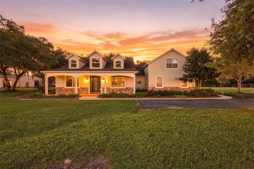 Photo of 15330 Sky Lake Lane, Tavares, FL 32778 (MLS # G5119122)