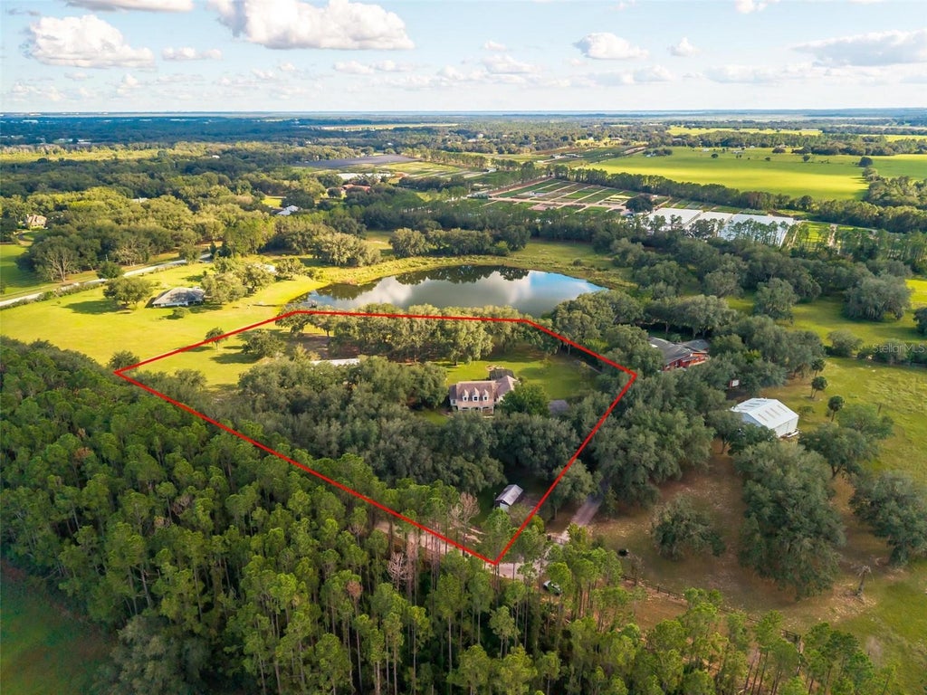 Photo of 15330 Sky Lake Lane, Tavares, FL 32778 (MLS # G5119122)