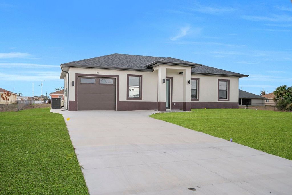 Photo of 4003 10th Street SW, Lehigh Acres, FL 33976 (MLS # A4683621)