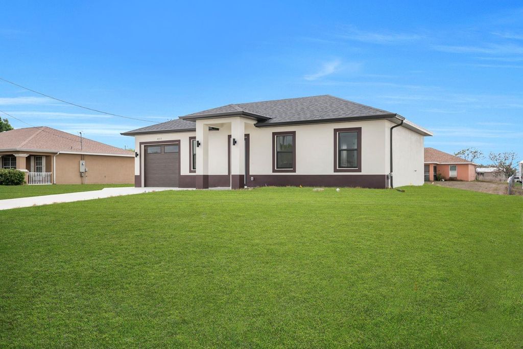 Photo of 4003 10th Street SW, Lehigh Acres, FL 33976 (MLS # A4683621)