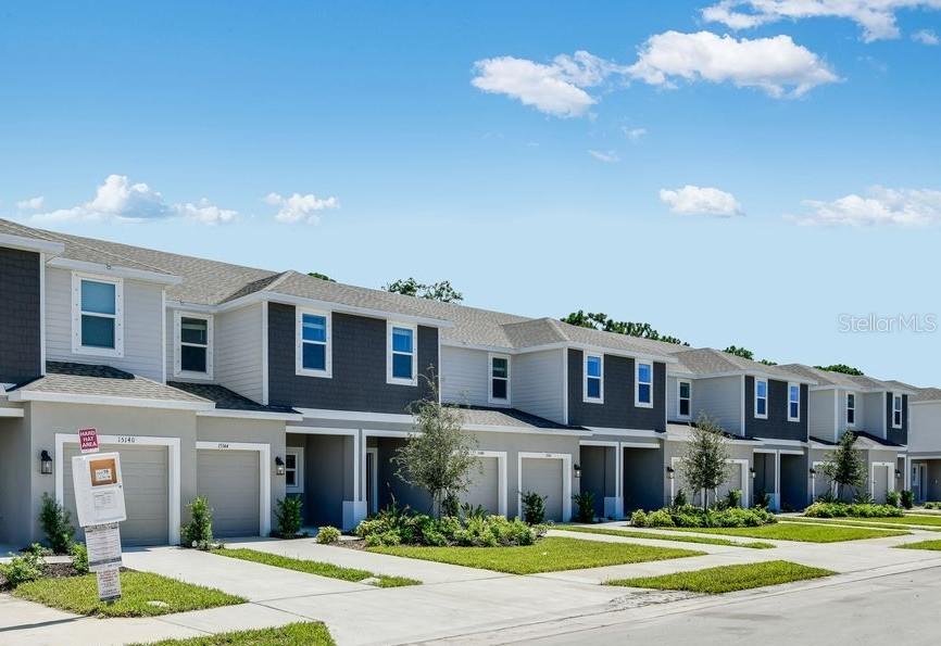 New Construction - Ready Now! Built by Taylor Morrison, America's Most Trusted Homebuilder. Welcome to the Jasmine at 15152 Cuzcorro Court in Vinterra Townhomes—1,373 square feet of comfort, style, and smart design! This charming home features 3 bedrooms, 2.5 baths, and a one-car garage. Step inside from the cozy front porch into a spacious great room that flows into an open kitchen with a large island—perfect for meals and entertaining. The first floor also includes a half bath, garage access, and a roomy patio for outdoor fun. Upstairs, you’ll find two bedrooms with a full bath and a spacious primary suite with a walk-in closet and double vanity. The laundry area is conveniently located upstairs, too. Need storage? You’ve got it—with under-stair space, a pantry, linen closet, and generous bedroom closets. The Jasmine is more than a townhome—it’s your place to feel at home. Outside your door, find a pool, cabanas, dog park, butterfly garden and access to the 18-mile Legacy Trail with walking and biking paths. Nokomis Beach, Casey Key and Siesta Key are less than 5 miles away. Or head to Oscar Scherer State Park to kayak, fish, swim and picnic. Pine View School is close by. A sun-soaked lifestyle awaits—reach out and grab it! Additional Highlights Include: whole house blinds, all appliances and extended tile flooring. MLS#A4651452