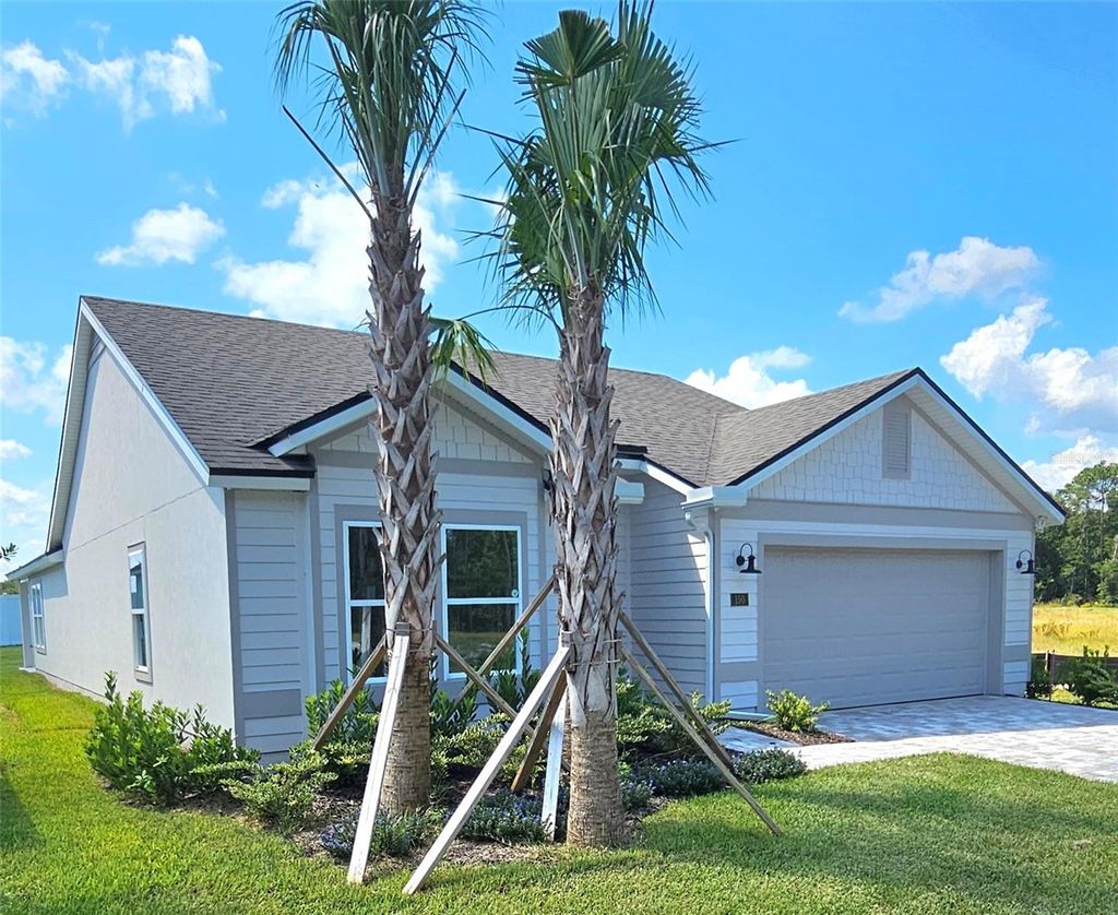 Photo of 150 Greenwood Drive, Palm Coast, FL 32137 (MLS # FC312926)