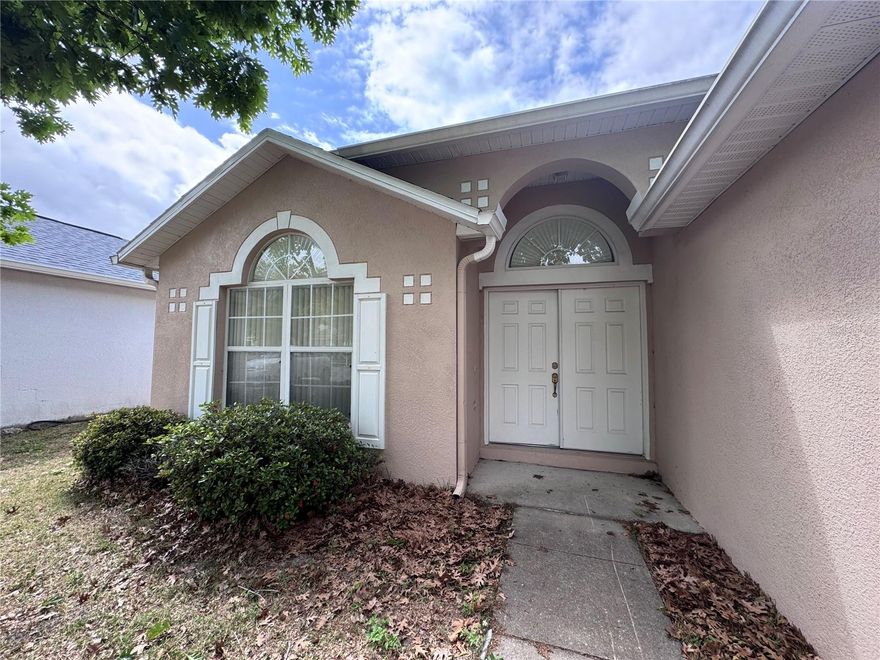 Priced to sell! This beautifully maintained 3-bedroom, 2-bath home sits perfectly between downtown Groveland and downtown Clermont, offering convenience, comfort, and a peaceful setting. Located in the desirable Lake Dot Landing community, this Maronda-built home features high ceilings in the living, dining, and primary bedroom, creating an airy and spacious feel throughout. The primary suite offers a large soaking tub, and walk-in tile shower, and a walk-in closet. The split floor plan places the two additional bedrooms on the opposite side of the home, separated by a full bath with a tub/shower combination. An inside laundry room and attached two-car garage add everyday convenience. Enjoy no rear neighbors and a tranquil conservation view from the screened-in back patio—perfect for relaxing and enjoying nature. Come see this wonderful and affordable home today!