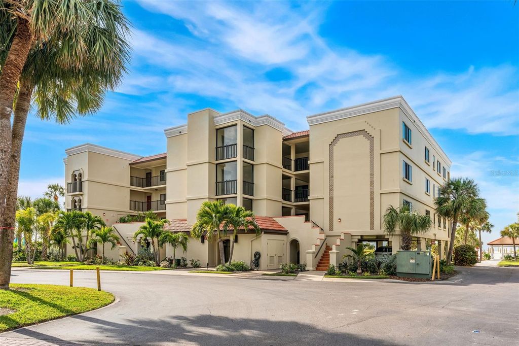 Photo of 7532 Bayshore Drive #203, Treasure Island, FL 33706 (MLS # O6370777)