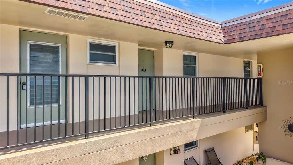 Photo of 9945 47th Avenue N #203, St Petersburg, FL 33708 (MLS # TB8536573)