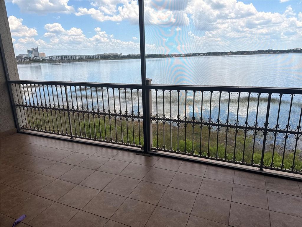 Photo of 8767 The Esplanade #39, Orlando, FL 32836 (MLS # O6402675)