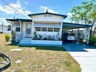 Photo of 1611 Blue Lake Drive, Lakeland, FL 33801 (MLS # TB8548094)