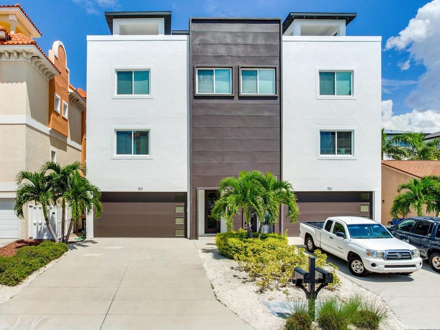 High and Dry! Elevated townhome, no living space on ground level to be damaged by flood water. Contemporary townhome in Redington Shores is just a steps from the beach, local grocery stores, restaurants, and many local boutiques. Bring the whole family, relax in style, and experience the authentic beach lifestyle on Florida’s Gulf Coast. Built by Lubke Construction in 2017, this townhome was engineered and built in the strongest possible way. Starting with the foundation, which has (84) 35’ pilings, 100% concrete floors on all levels, 100% masonry walls, all impact windows and doors, and even a concrete roof! Very unique property that also has a 1200 sf rooftop deck with great space for games and outdoor living, as well as amazing views. This unit is currently fully furnished (all new furniture, linens, dishes, art, small appliances December of 2022) there is an option to purchase fully furnished for additional price. The gorgeous kitchen area will quickly become your family’s favorite hangout spot as it has room for everyone. The chefs of the family will appreciate the modern appliances, expansive counter space that that connects to a large breakfast bar, with sleek countertops and a modern backsplash. Whip up your family’s favorite meal on the 4-burner stove with cast iron griddle. The breakfast bar is the perfect place to enjoy a quick breakfast before a day exploring the beach, and the six high top seats make it a comfortable place to sit and get some work done. The kitchen transitions right into the main room which is complete with an elegant dining room table, a comfortable sectional couch, and seating for all. Sliding glass doors lead from the dining room out to the lower balcony. The bed configuration is as follows: 2 king beds, 4 full beds, and one pull out. The master suite is on the 3rd floor and features a private master bathroom with a soaking tub, enclosed shower, and toilet room. The elegant vanity area has plenty of space for all of your toiletries. This bedroom with a king size bed boasts a private third floor balcony where you can listen to the sounds of the shoreline. The third floor also has two bedrooms that each have bunk beds with full mattresses. The main level has a guest bedroom that also has room for sitting area or office. All bathrooms have plenty of natural light. There is also a full laundry room with a washer, dryer, and plenty of room to fold and sort your clothes. The home is equipped with wi-fi including repeaters at the living levels, and has three brand new 55” OLED 4k UHD Smart TVs so you can stream from all of your favorite subscriptions. All of the balconies have seating to enjoy those peaceful outdoor moments. The main level balcony also has a gas grill to enjoy some BBQ. There is also a separately engineered elevator shaft that can accept a 4-stop elevator.