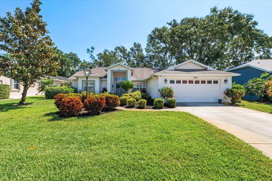 9422 Hawksmoor Lane is nestled in the heart of Stoneybrook Estates, this charming and meticulously maintained residence awaits you. The appealing split plan design boasts tasteful updated features including oak flooring, crown molding and plantation shutters throughout. The completely remodeled kitchen features stainless steel appliances, granite counter tops, farmhouse sink, undercabinet lighting, all new recessed lighting & lights.  The family room with a cathedral ceiling and plenty of natural light, sets the perfect stage for entertaining, with a pocketing sliding glass door that opens to spacious, oversized lanai with a private greenbelt view to bring the outdoors in--a wonderful space in which to enjoy your morning coffee or evening cocktails.  When you feel like going for a swim, the large, heated community pool is just a short walk away. Membership in the semi-private Stoneybrook Golf and Country Club is not required or offered in this section of the community. However, non-members may dine at the clubhouse and have limited golf access. Stoneybrook at Palmer Ranch is a gated community with mature landscaping and well-kept homes, superbly located and proximate to schools, shopping, entertainment, casual and fine dining, medical facilities, the Legacy Trail and the world-renowned Siesta Key Beach.