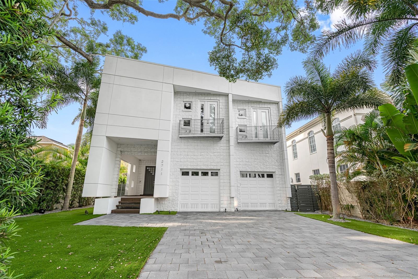 South Tampa's Finest! One of the most desirable locations in the country. Just minutes to the world famous Bayshore Blvd and flourishing downtown Tampa. MOST HOMES IN THIS PRICE RANGE ARE 3000 -3500 SQ FT UNDER AIR. THEY DO NOT COMPARE TO THIS MASSIVE 4,701 SQ FT UNDER AIR HOME. This contemporary 6-bedroom 4½ bath Pool home was completely remodeled in 2018. It has the strength and stability of a concrete fortress, combined with the luxury and curb-appeal of an architectural masterpiece. With soaring high ceilings overlooking the open and bright floor plan, the foyer entrance will take your breath away…but breathe deep, because the family room and kitchen, both facing a wall of glass that leads to a private lushly landscaped pool & hot tub area, is no less impressive. The Lanai and Outdoor Kitchen are ideal for lavish entertaining and enjoying the highly coveted Florida lifestyle. Access the second level of this retreat via the Custom Private Elevator, or Open Stairs that traverse over a Wine room with up-lighting that accentuates the beauty of this feature. For movie nights, relax and enjoy the Home Theater. The kitchen features a huge marble island, gas Wolfe cook top, Subzero refrigerator, and Bosch dishwasher and overlooks the Family room, Living Room, and Pool area - Huge master suite that leads to large balcony that overlooks the pool - Large walk in shower, a jetted tub, and walk in closet with built ins – Saltwater heated Pool – Water Filtration system throughout the whole house - Maintenance free landscaping Turf – Oversized 2 car garage – Home Security - Surround Sound -Nest Smart Thermostat – This home is a must see!