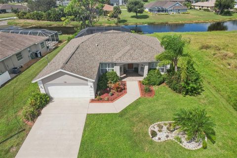 Photo of 158 Mark Twain Lane, Rotonda West, FL 33947 (MLS # TB8434228)
