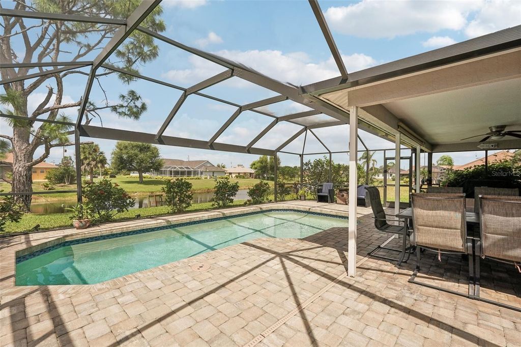Photo of 158 Mark Twain Lane, Rotonda West, FL 33947 (MLS # TB8434228)