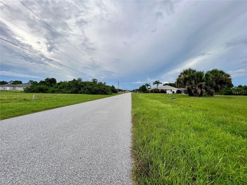 Photo of 172 Tournament Road, Rotonda West, FL 33947 (MLS # C7493949)