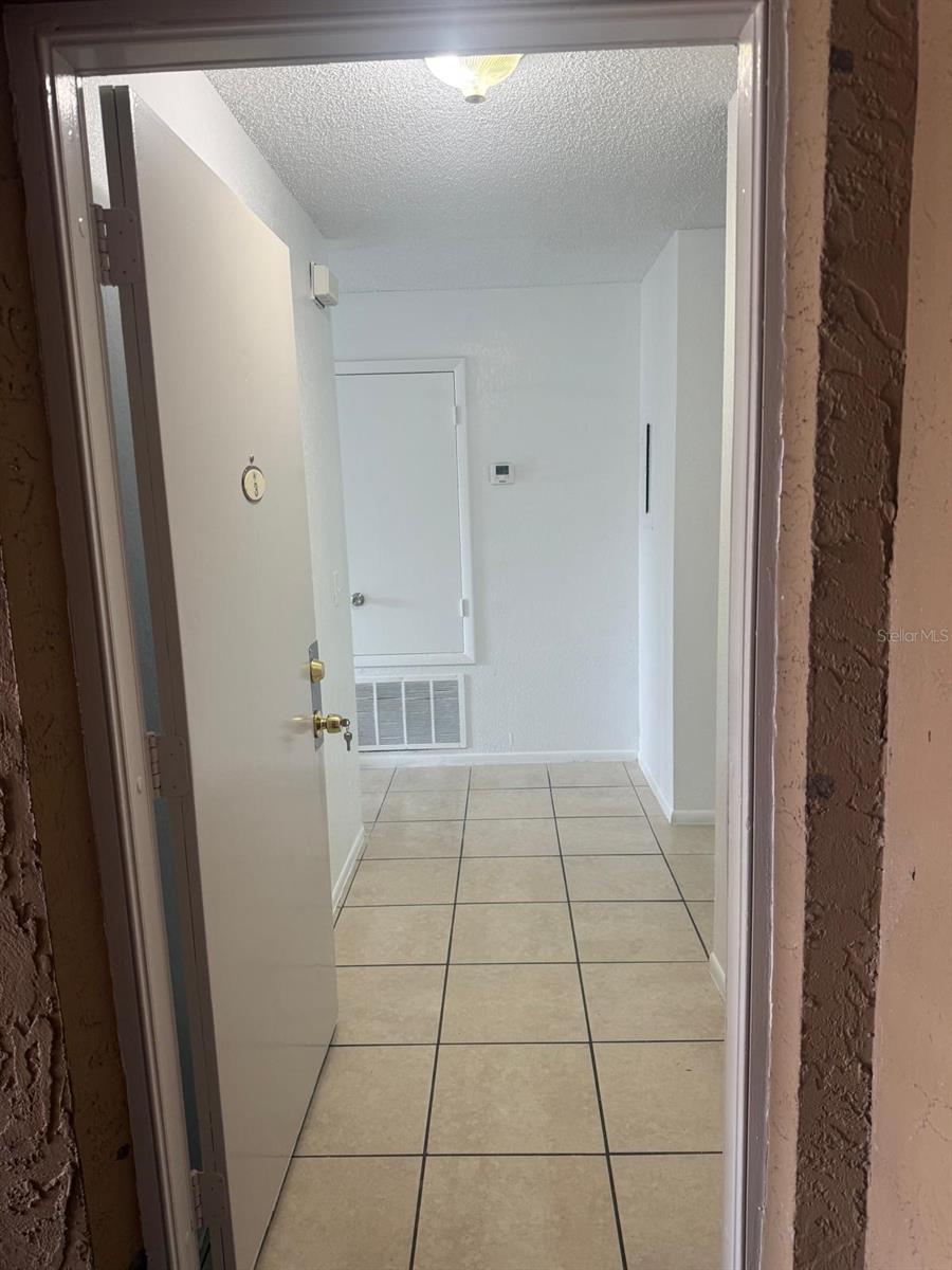 Photo of 2401 Barley Club Ct #2, Orlando, FL 32837 (MLS # O6437577)