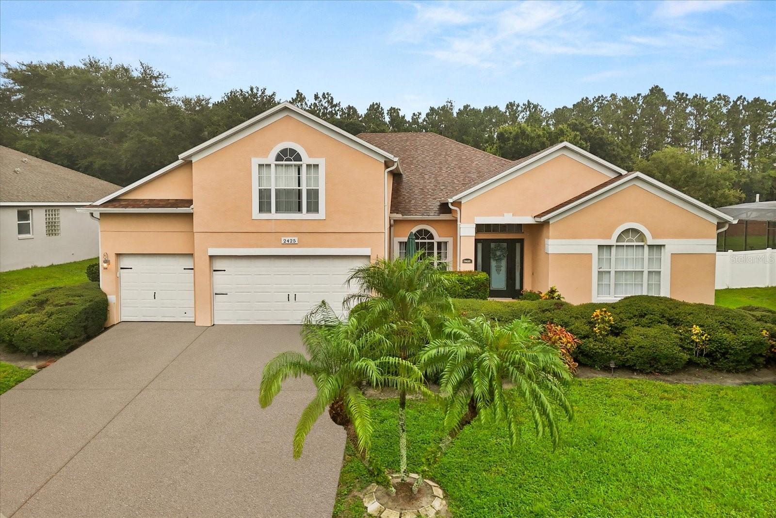 Welcome to your next home—where space, comfort, and functionality meet in perfect harmony. Located in a gated community, this impressive 5-bedroom, 3-bathroom home spans approximately 3,500 heated square feet and offers a flexible layout designed to fit every lifestyle. The upstairs bonus room is privately tucked away, perfect for a media room, guest suite, or home office. Perfectly situated in a prime location, this home is zoned for A-rated schools and is just minutes from Orlando’s top attractions, resorts, dining, and entertainment. Step inside to discover thoughtful upgrades, soaring ceilings and an abundance of natural light that fills every space. The home is both warm and cozy, yet spacious enough to accommodate everyone—with flexible living areas that can easily be tailored to your needs. Between the guest bedrooms there is a loft tucked away from the main areas of the home, and one of the spare bedrooms features its own bathroom. Enjoy peace of mind with a NEW ROOF and an upgraded electrical panel ready for a whole-house generator. The home also features a 3-car garage, an oversized fully fenced backyard, and a beautiful screened-in, covered patio—ideal for entertaining or enjoying peaceful Florida evenings. This is more than a house—it’s a lifestyle. Don’t miss your chance to call this extraordinary property home!
