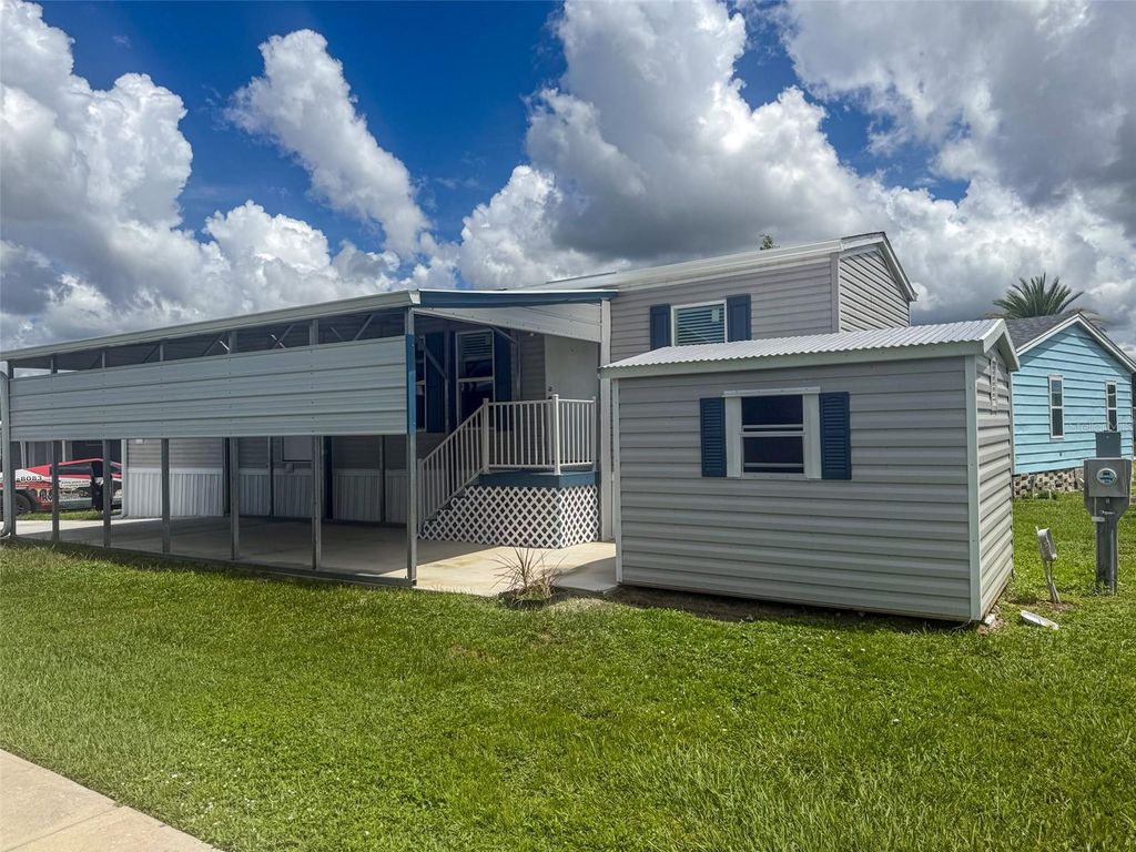 Photo of 5700 Holiday Park Boulevard, North Port, FL 34287 (MLS # A4661489)