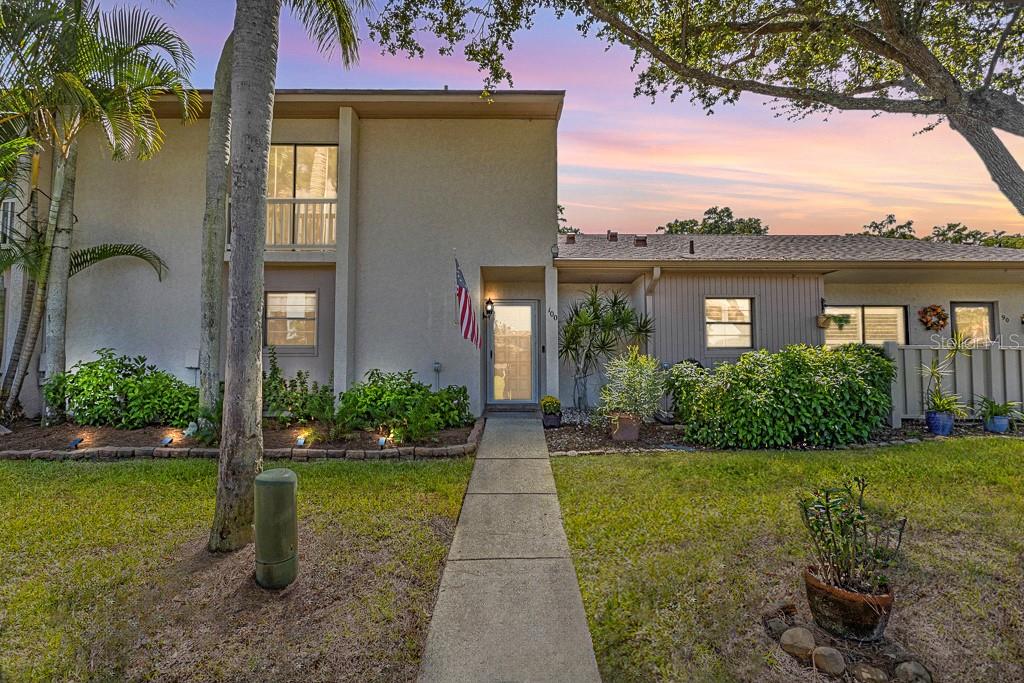 Great opportunity to own this Lovely Updated 3 Bed, 2.5 Bath East Lake Woodlands Townhouse. Enjoy the Tranquility of the Gated Golf Course Community with its lush beautiful landscaping & 2 18-hole Courses. This 2 Story Townhome has an open Expansive Great Room floor plan with Dining area featuring tile flooring & overlooks Conservation with Pond and Privacy. The large Kitchen features Stainless Steel appliances (New 2021) and a large Breakfast Bar. Updated Half bath on ground floor ideal for guests. Upstairs you'll find the Primary Bedroom with En-suite Bath, Dual Closets and a screened tiled Patio with breathtaking views. Primary Bath with Dual sink vanity and Remodeled Step-in shower. 2 additional Bedrooms share an adjacent Bathroom with Tub/Shower. Step out onto the spacious Balcony where you can relax and observe wildlife. The concrete outdoor Patio area is ideal for a BBQ or your morning coffee. Wonderfully convenient location to Shopping, Restaurants, Beaches, County Parks and International airports. Optional Ardea country club memberships provide access to two 18-hole golf courses, tennis facilities, and an array of social amenities, including dining, swimming, and fitness. Pet friendly, Maintenance free living... Doesn't get better than that! Don't miss the opportunity to experience the best of Florida living in East Lake Woodlands. Roof 2025. A/C 2019. Hot Water Heater 2021. No Popcorn Ceilings- removed 2021.