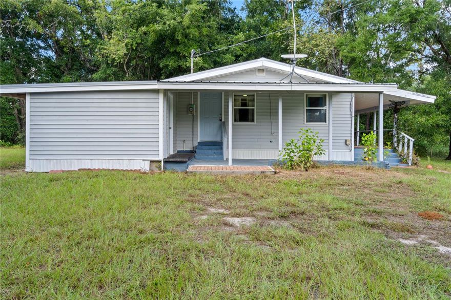 COUNTRY COTTAGE RETREAT!
Welcome home to this charming 2 bedroom, 1 bath cottage that blends comfort with convenience. Step onto the large covered front porch, the perfect place to relax and enjoy the peaceful country setting. Inside, you’ll love the open floor plan with a spacious living room and kitchen area that makes entertaining a breeze.
The home features a metal roof, carport, and a handy laundry/storage area just off the carport, plus an additional storage shed for all your tools and extras. Sitting on a .48-acre fenced lot, there’s room for pets, gardening, or simply enjoying the outdoors.
Located down a quiet country lime rock road, yet within walking distance to Dollar General, this property offers the best of both worlds—country charm with close-by convenience. It’s just a quick drive to Williston and Bronson, and an easy commute to Gainesville and Ocala for work, shopping, and dining.
Don’t miss your chance to own this sweet country cottage—schedule your tour today!