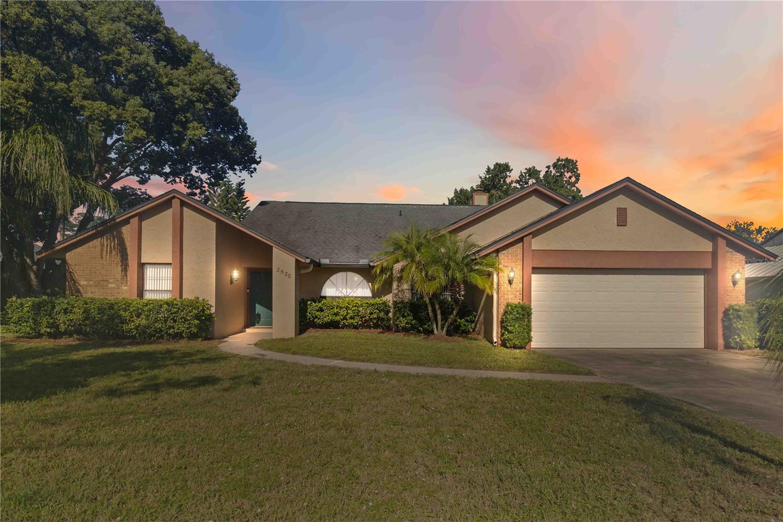 Welcome to your dream home in sought-after Oviedo! This spacious 4-bedroom, 2.5-bath residence offers 2,101 square feet of thoughtfully updated living space, perfectly blending modern finishes with timeless comfort nestled on just over a quarter acre lot. The heart of the home is the stunning expanded $45,000 kitchen remodel with upgrades including custom solid wood cabinets with stainless steel hardware, gleaming granite countertops, and an impressive cooking island over 8 feet long. The space is enhanced by new tile flooring, stainless steel appliances, and elegant undermount cabinet lighting and faucet, making it a chef’s paradise and entertainer’s delight. From cozy corners to open gathering areas, every room in this home delivers comfort and creates the perfect backdrop for entertaining family and friends. With its generous proportions and serene pool views, an oversized porch creates a seamless connection between shaded comfort and the outdoors as you step outside. A sizeable, sparkling, resurfaced pool, refreshed in 2018 with new tile, pool pump, timer, complemented by a brand-new cool deck installed in 2023 and solar panels for energy efficiency. The pool area is beautifully adorned by lush bamboo providing privacy, ideal for relaxing or hosting gatherings.This home has been meticulously maintained with many improvements: a new roof (2018), dual AC replacements (2014), a new hot water heater, and a skylight adding natural light, all-new interior doors (2013), removal of popcorn ceilings throughout, insulation in the attic 2023, the guest bathroom updated in 2015, new electrical panel 2019, full home re-pipe in 2012, seamless gutters and downspouts (2018), fresh carpeting on the lanai and even more that can be found on the feature sheet. Plus, enjoy the convenience of a separate irrigation meter and a very low HOA community. Every detail has been cared for, making this Oviedo gem a move-in ready sanctuary that balances style, comfort, and smart upgrades. This beautifully maintained single-family home checks all the boxes—offering comfort, style, and unbeatable convenience. Ideally located near all of today’s modern amenities, you’re just minutes from top-rated schools, shopping, dining, parks, and entertainment. With quick access to major expressways, commuting is a breeze. Plus the walking trail off Tuskawilla Road just outside the neighborhood is part of the Cross Seminole Trail and is a paved, multi-use path that stretches for 29.4 miles, connecting Oviedo to other areas like Winter Springs and Lake Mary, just perfect for those who like to soak up the outdoors. Whether you're looking for a quiet place to unwind or a home base for an active lifestyle, this property offers the ideal balance of convenience, comfort, and space to live, work, and play. Don’t miss your chance to own this exceptional home—schedule your private tour today!