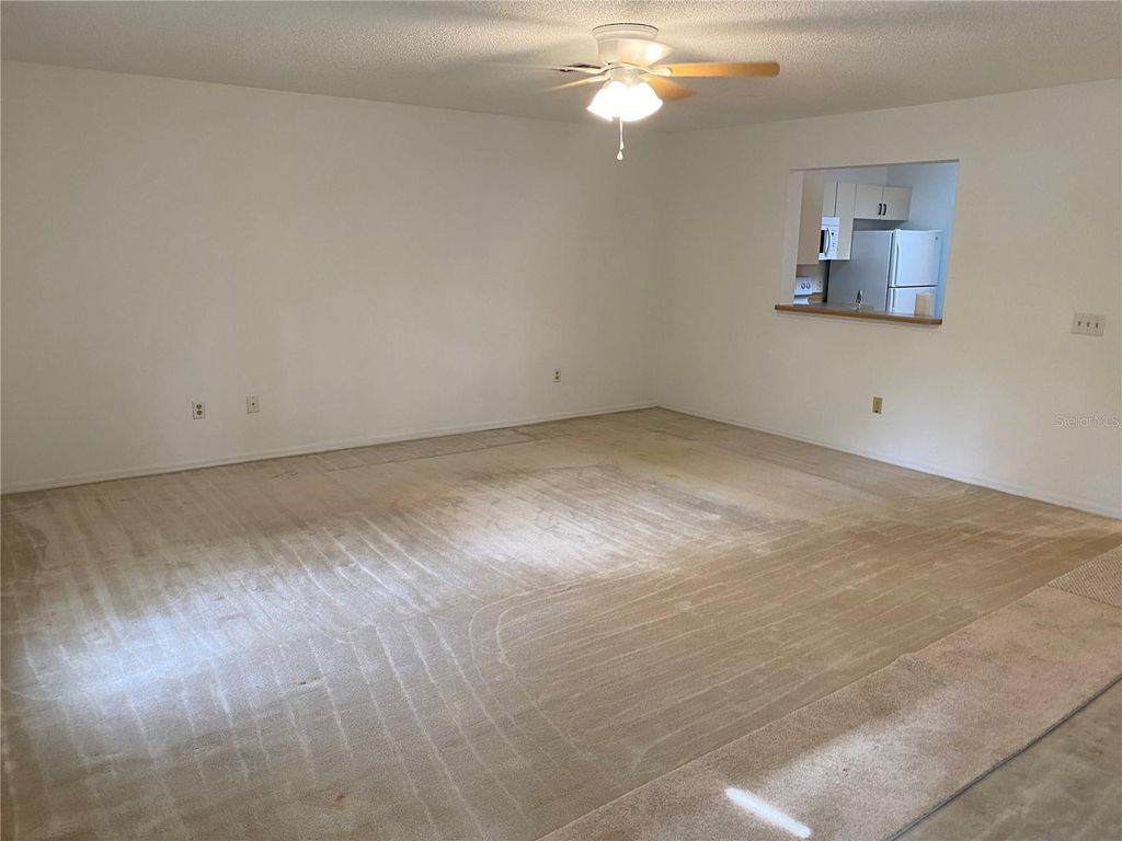 Photo of 3047 Oak Park Way #103, Orlando, FL 32822 (MLS # O6381112)