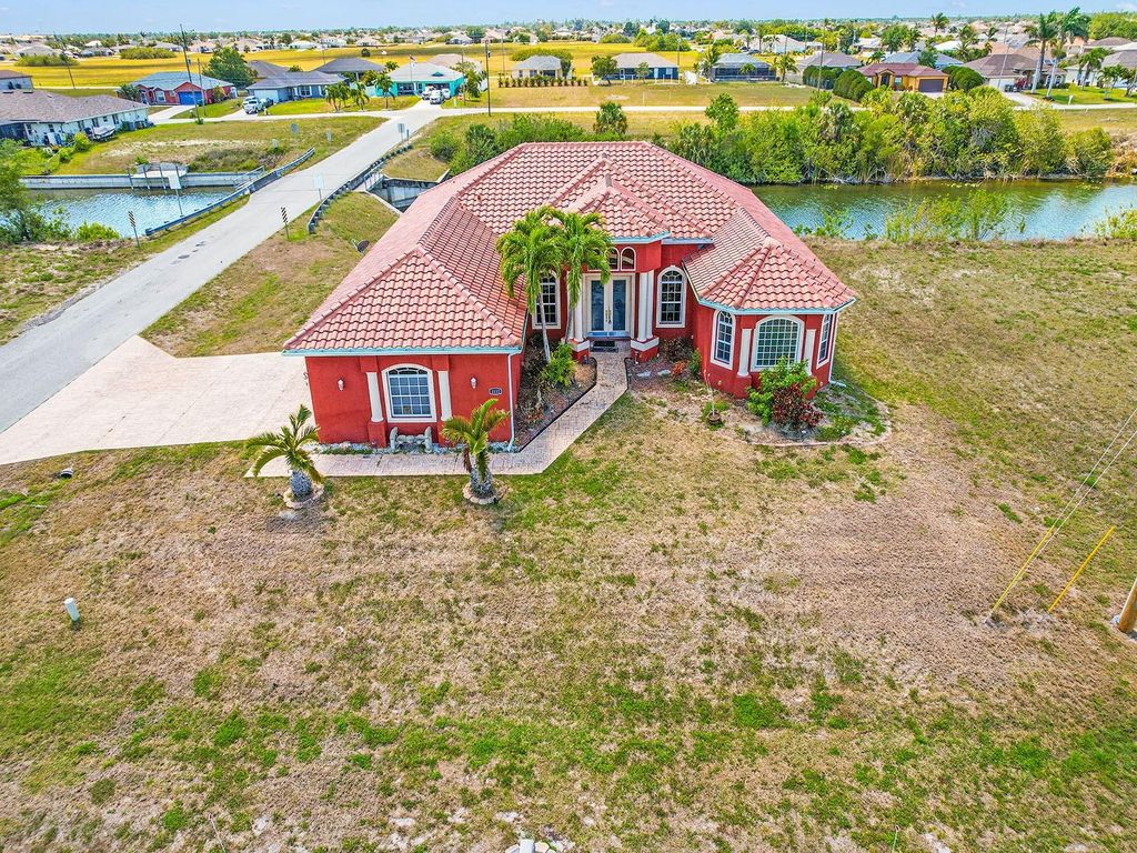 Photo of 1112 NW 9th Avenue, Cape Coral, FL 33993 (MLS # TB8375032)