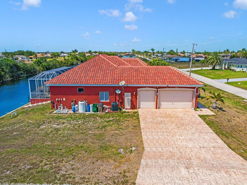 Photo of 1112 NW 9th Avenue, Cape Coral, FL 33993 (MLS # TB8375032)