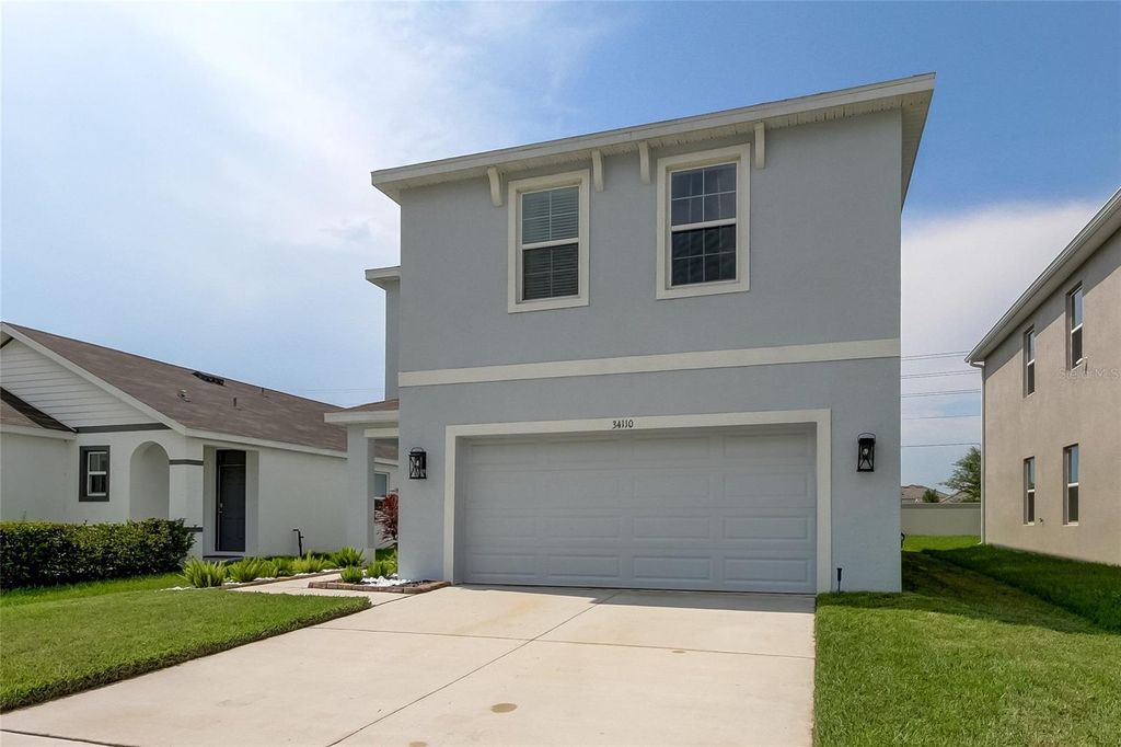 Photo of 34110 Jasper Stone Drive, Wesley Chapel, FL 33543 (MLS # TB8357089)