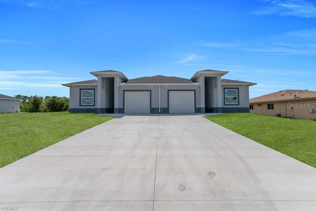 Photo of 4648 Leonard Boulevard S, Lehigh Acres, FL 33973 (MLS # A4674305)