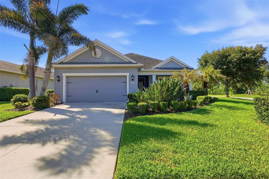 Experience refined Florida living in this impeccably maintained Neal-built residence, ideally situated within the prestigious gated community of Rivers Reach. Positioned on an oversized corner homesite spanning more than a quarter acre, this exceptional 3-bedroom, 2.5-bath home with a private den offers the perfect blend of sophistication, comfort, and resort-style outdoor living. From the moment you arrive, the home’s inviting front porch and lush tropical landscaping create a striking first impression. Inside, more than 2,200 square feet of thoughtfully designed living space showcases designer finishes throughout, including expansive tile flooring in the main living areas, engineered hardwood in select rooms, taller baseboards, fresh interior paint, and upgraded lighting that enhances the home’s modern aesthetic. The spacious primary suite is privately positioned at the rear of the home, offering tranquil views of the pool and outdoor oasis. Designed with both functionality and entertaining in mind, the gourmet kitchen features premium new high-end appliances, abundant cabinetry, and seamless access to the formal dining area, where picturesque sunset views provide the perfect backdrop for evening gatherings. Expansive sliding glass doors fully open to create a true indoor-outdoor living experience, effortlessly connecting the interior to the beautifully curated lanai. The outdoor entertaining space is exceptional, complete with a custom outdoor kitchen featuring granite countertops, a sparkling pool with a brand-new heater, and lush palms that provide both privacy and an airy tropical ambiance. A charming gazebo with lighting and ceiling fan creates the ideal setting for morning coffee or year-round relaxation. Every detail of this home has been thoughtfully considered, including abundant storage solutions throughout. An oversized walk-in pantry with private kitchen access, additional closets, garage cabinetry, and overhead storage racks ensure both convenience and organization. Residents of Rivers Reach enjoy an unparalleled lifestyle surrounded by Old Florida beauty while still benefiting from an impressive array of resort-style amenities, including direct access to the Manatee River with kayak and canoe launch, scenic walking and biking trails, a heated community pool and spa, fitness center, and outdoor picnic and grilling areas. This extraordinary home offers the rare opportunity to enjoy luxury, privacy, and resort-inspired living in one of the area’s most sought-after gated communities.