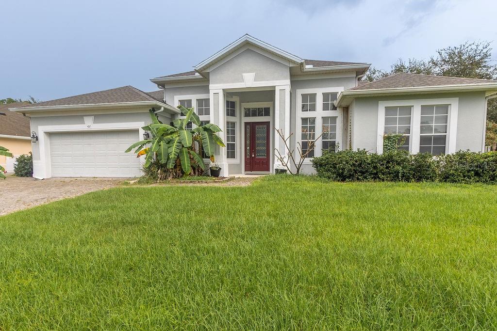 Photo of 421 Holly Fern Trail, Deland, FL 32720 (MLS # V4951183)